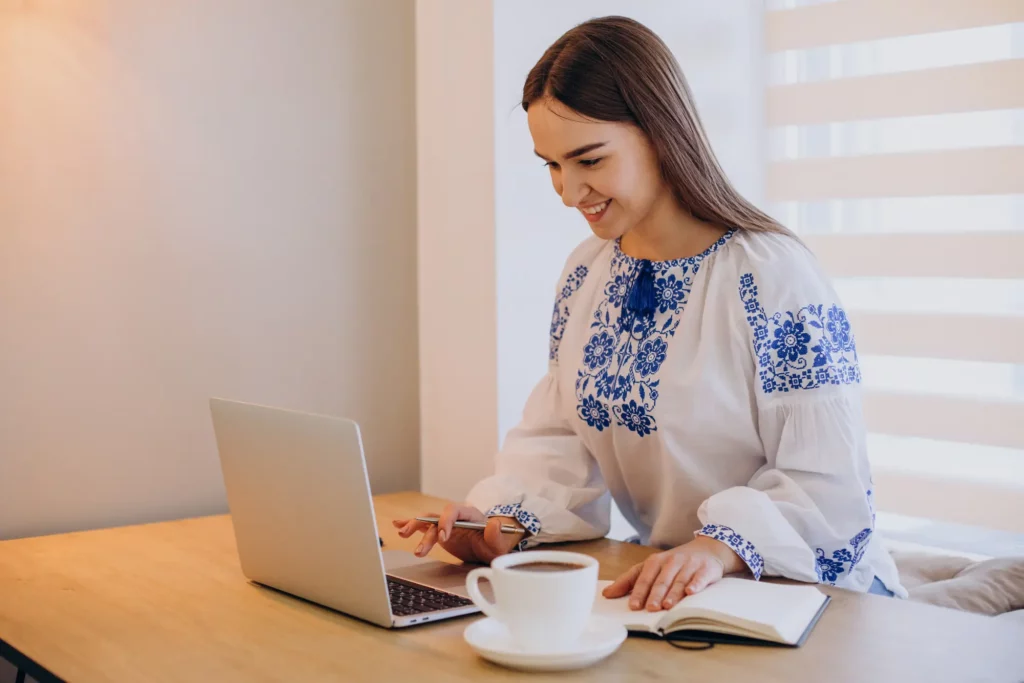 young-ukrainian-woman-wearing-vyshyvanka-working-from-home